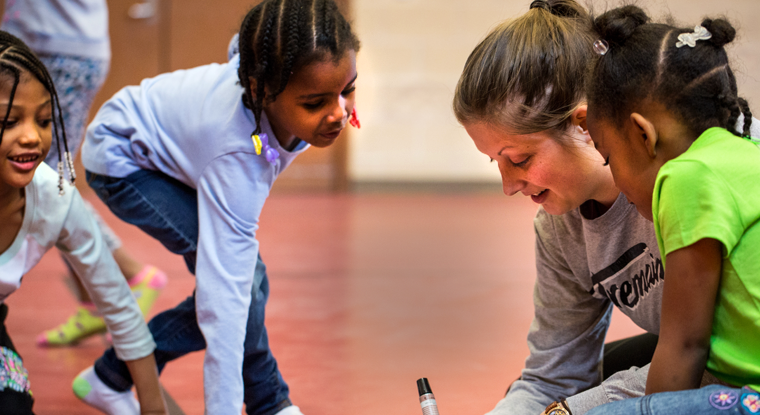 3.	A dance undergraduate collaborates with students at Lussier Community Education Center for an original dance routine.