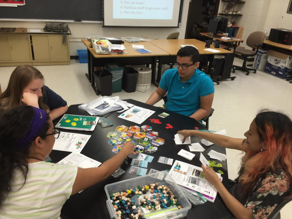 Students in the PEOPLE program play a round of “Dwindle” to learn how to manage limited resources. <i>Photo courtesy of Mike Lawton</i>